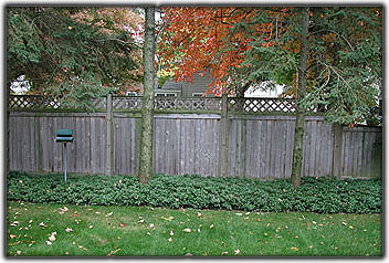 aged wood fence by Elyria Fence